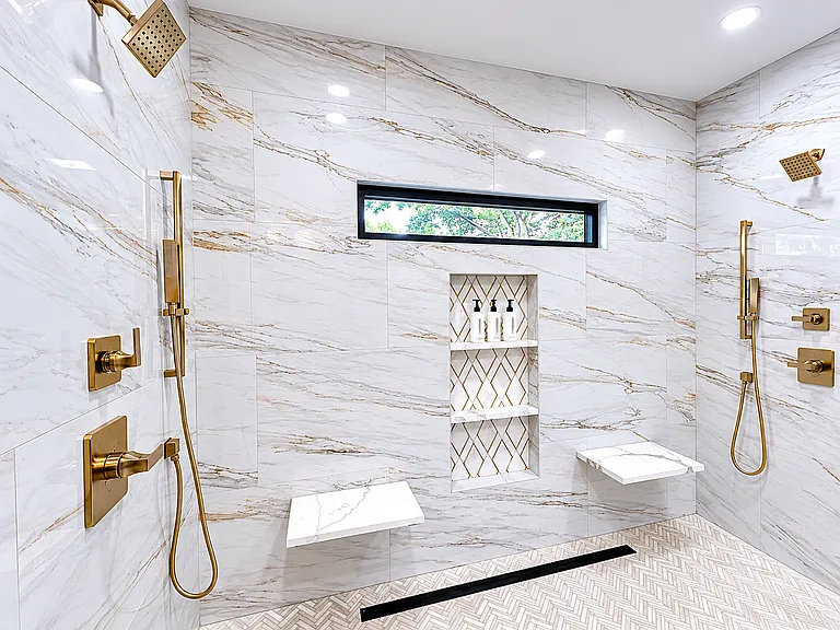 Step inside luxury for a showering experience reminiscent of a waterfall, spa. Spa-inspired primary bathroom in the Edgewood Suite featuring luxury, large walk-in shower with rainfall & dual shower heads & premium Apotheke bath products.