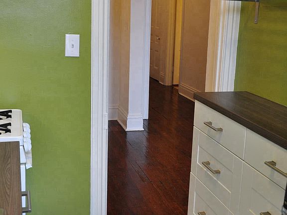 Kitchen, looking towards Dining Alcove and Entry Hall beyond