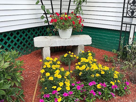 Corner trellis near porch