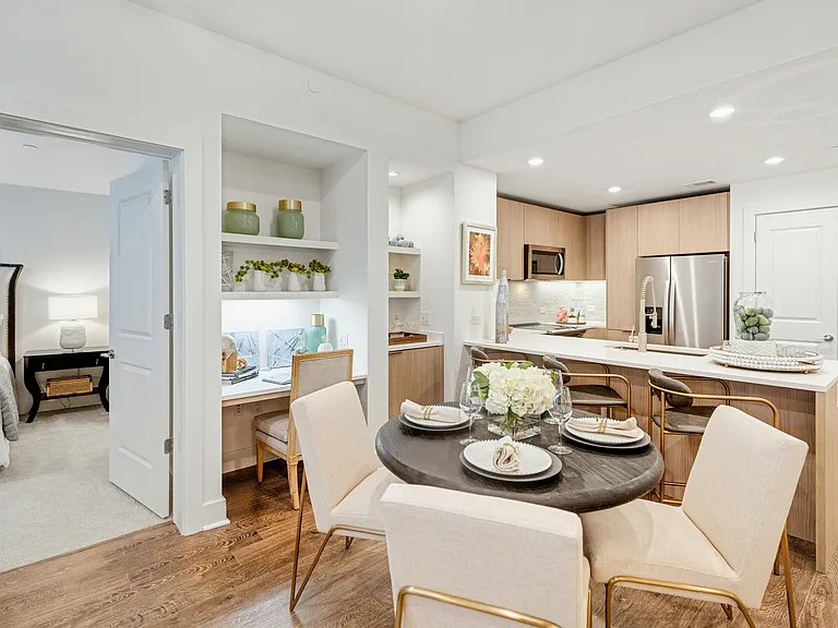 Wood-style flooring in living and dining areas
