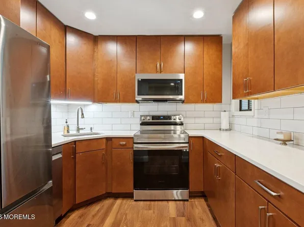 92 Arrowood Road #E, Manalapan, NJ 07726