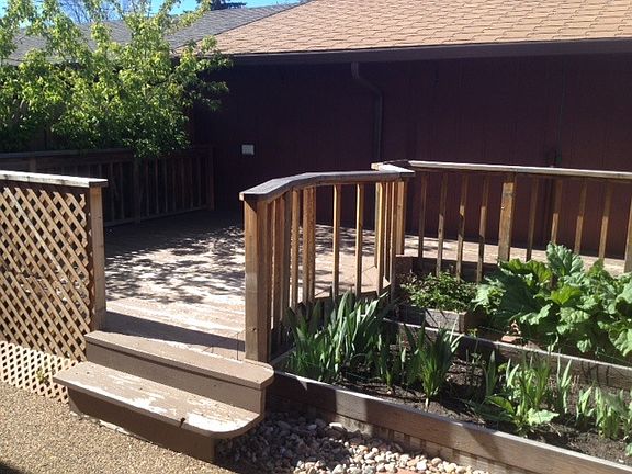 Private Back patio with raised beds