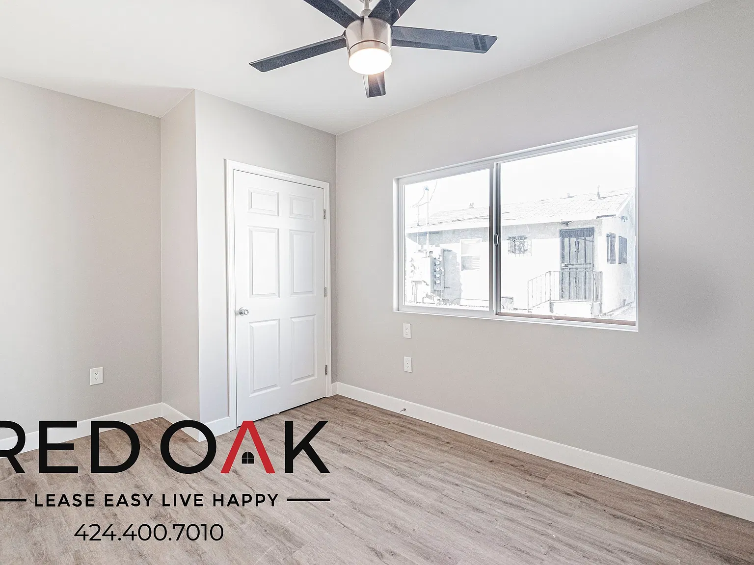 Sunlit 4-Bed with Stainless Steel Appliances, Air Conditioning, In-Unit Laundry and Parking Inclu... — Photo 3