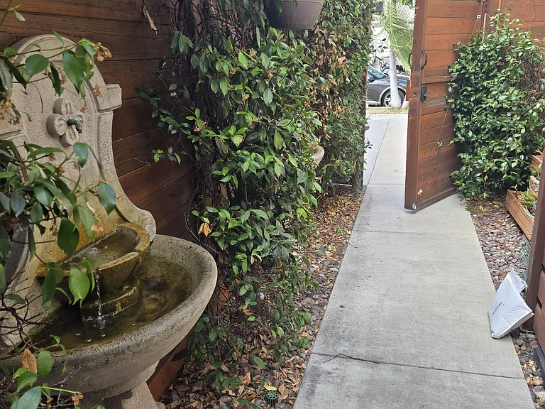 This is the Pathway entrance through the Security Gate showing one of the many fountains along the pathway