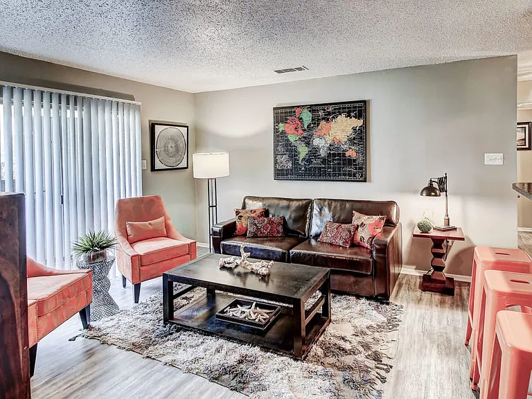 Living Room with lots of natural light and hardwood style floors