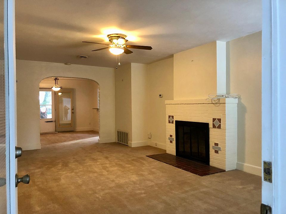 Spacious living with planned gas fireplace.