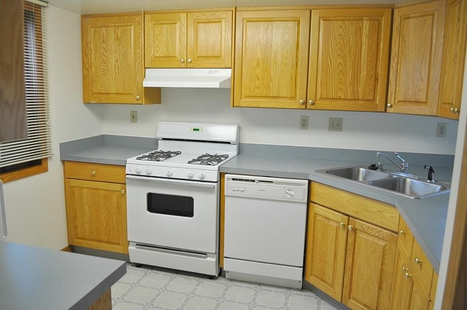 Spacious kitchen with plenty of cabinet space and a pantry.