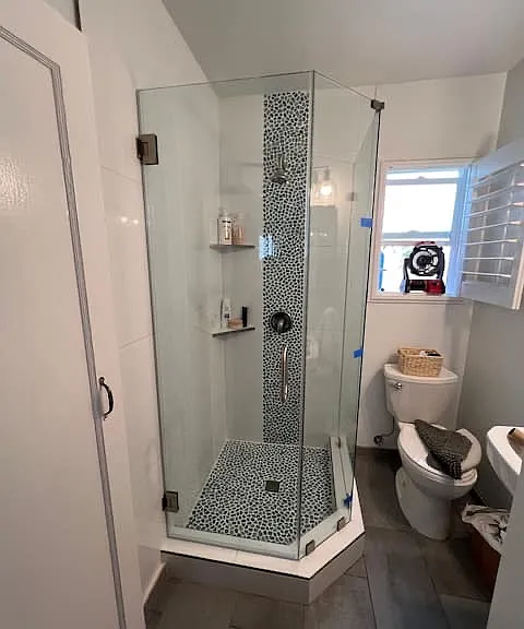 Gorgeous remodeled bathroom with a custom shower