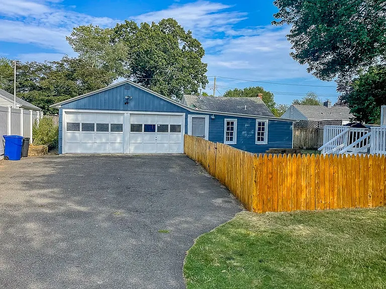 2 car garage. one door opens manually. the other side does not open.