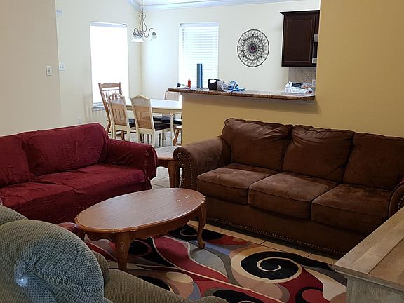 Living Room (18_ x 15_) _ Open to Kitchen & Dining areas, co-ax cable drops, entry coat closet, vaulted ceiling w/ceiling fan