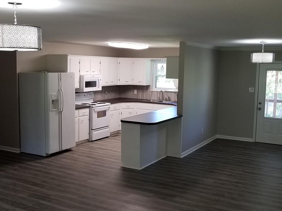 Open floor plan with a breakfast bar