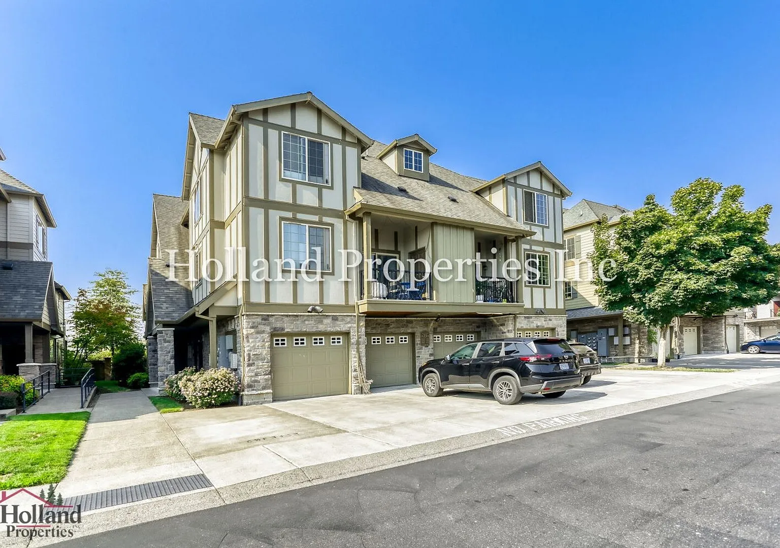 Stylish Single-Level Living with Green-Space Views & Resort-Style Amenities — Photo 1