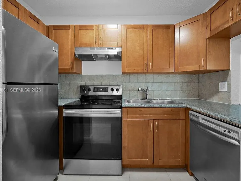 6953 SW 7th St — Photo 11