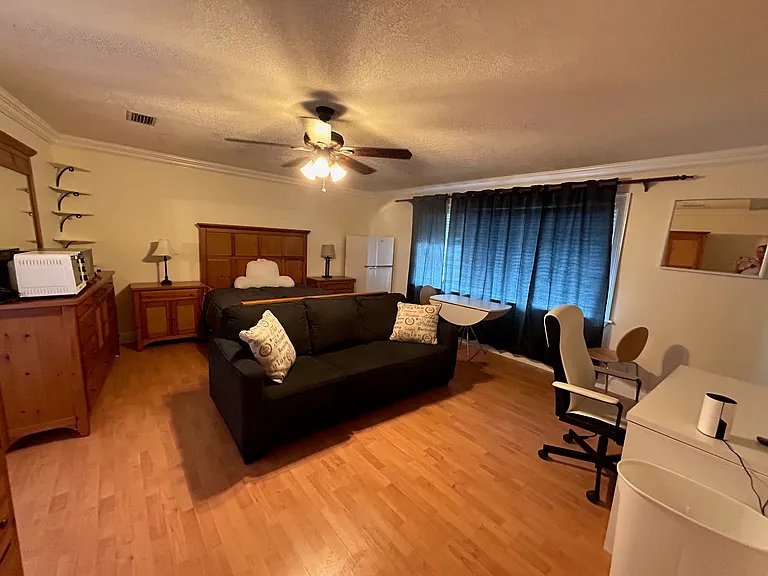 Queen bed, two night stands, two dressers, desk, office chair, lots of windows