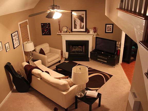 Huge vaulted ceilings and a fireplace with natural gas logs.
