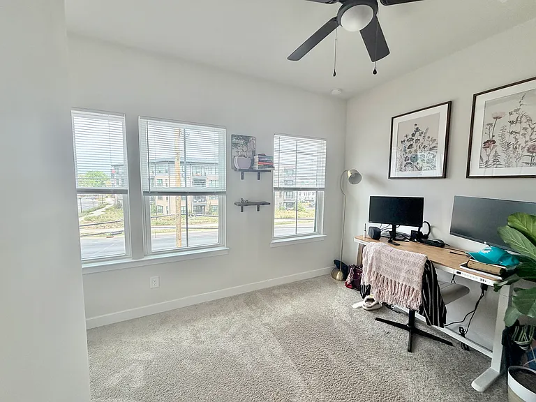 2nd bedroom with natural light, closet and attached full bathroom
