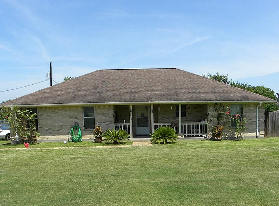 Beautiful, recently built brick home with a charming front porch