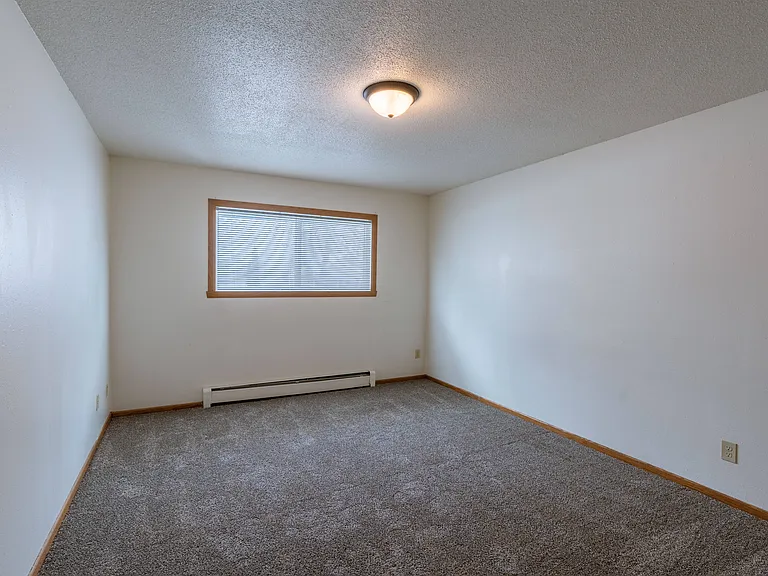 Fargo, ND Schrock Apartments | Bedroom