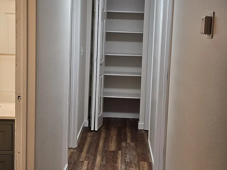 Hallway down to bedrooms.