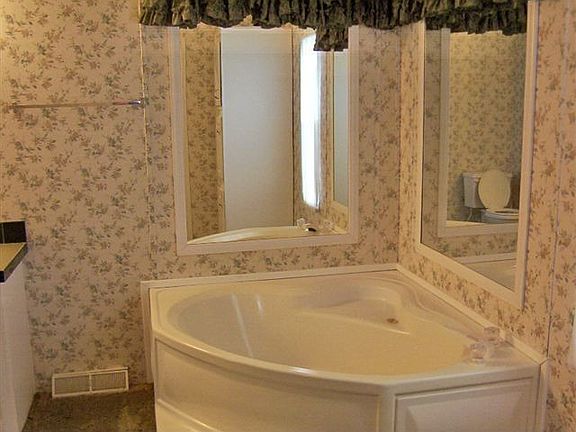 m/bath corner garden tub