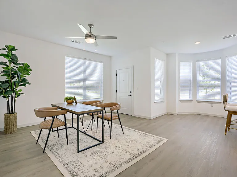 The stunning curved bay window wall creates an airy, light-filled dining experience unlike anything else in Longmont, CO. Garrett Harvest Junction West.