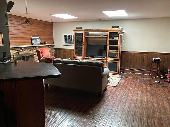 tv area with fireplace