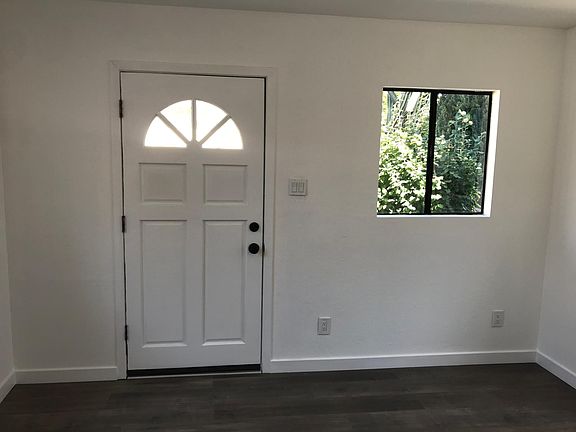 3 windows in living room for lots of natural light