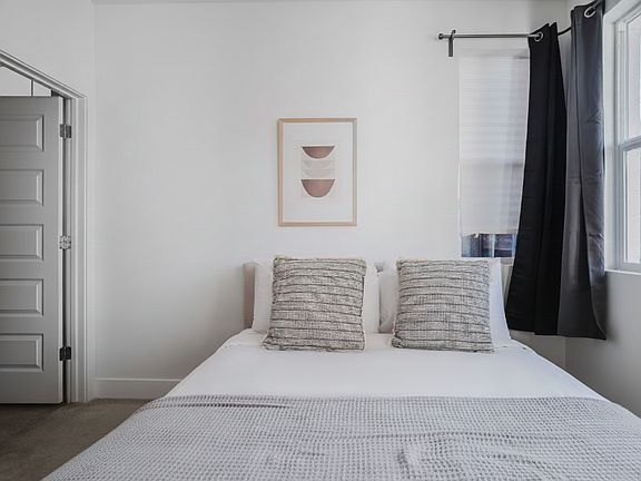 1st Floor Bedroom (Furniture shown for staging purpose only)