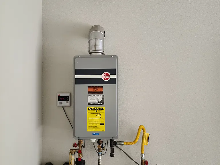 Tankless water heater. You'll never run out of hot water!