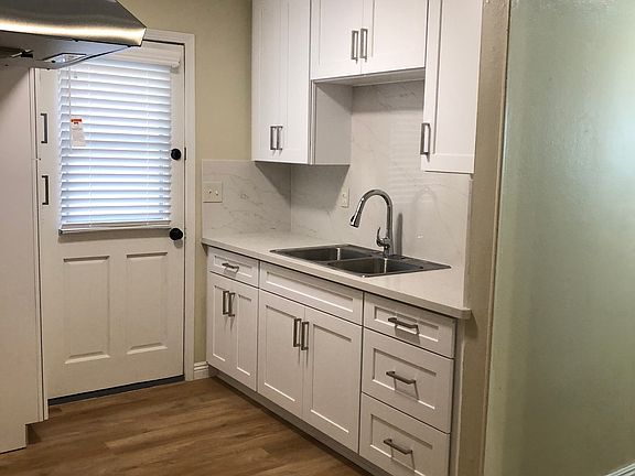 Kitchen, Golden River Quartz countertop, brand new cup boards, pantry, double stainless steel sink.