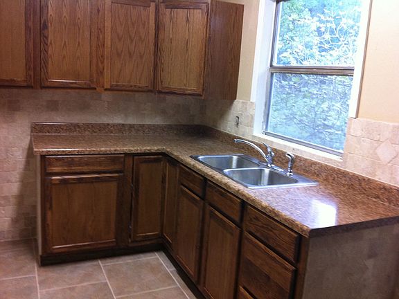 Brand new kitchen cabinet, countertops, and oven/range
