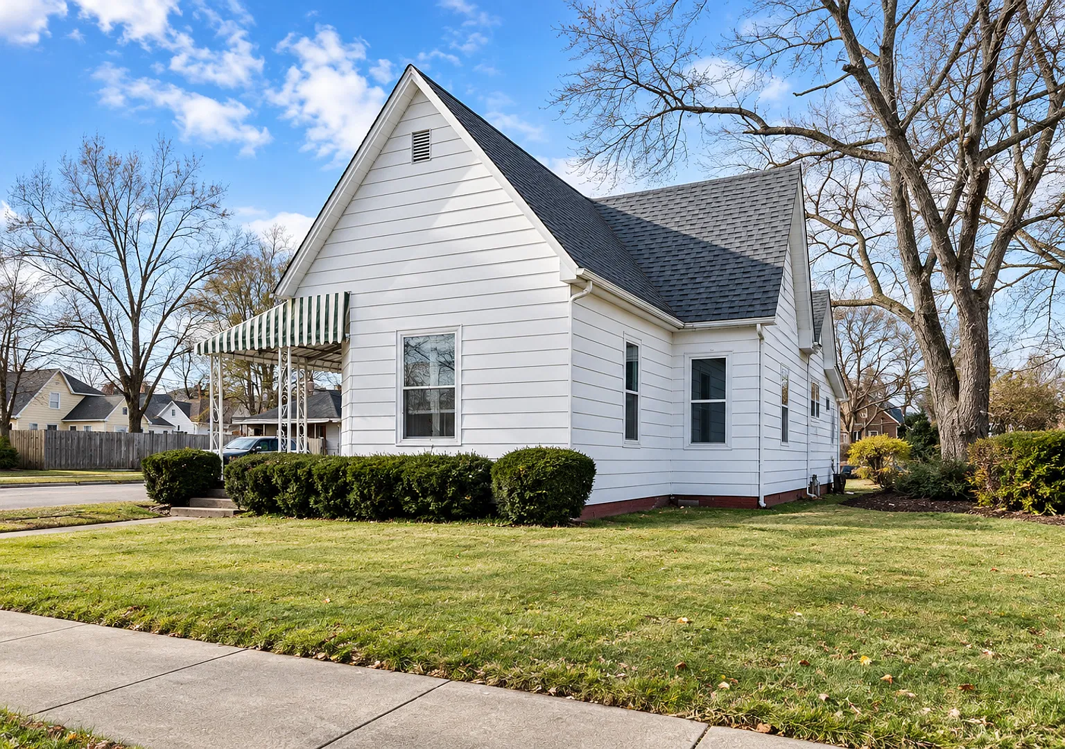 Charming 2-Bedroom Corner-Lot Home with Modern Updates & Garage! — Photo 1