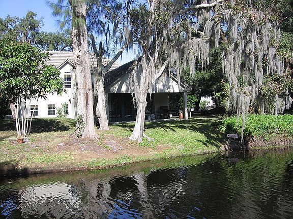 view form the water showing large covered deck