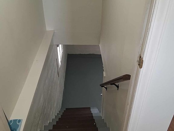 Down Stairs for wash room and extra storage.