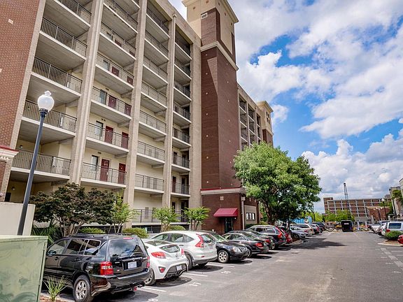 Back of building with owner parking only. Parking pass provided for River Place Parking Deck right next door. There is a 20 minute loading zone at the back entrance to the building for your convenience