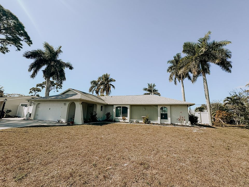 Front of the home. 2 car garage. Room for 3+ vehicles in the driveway.