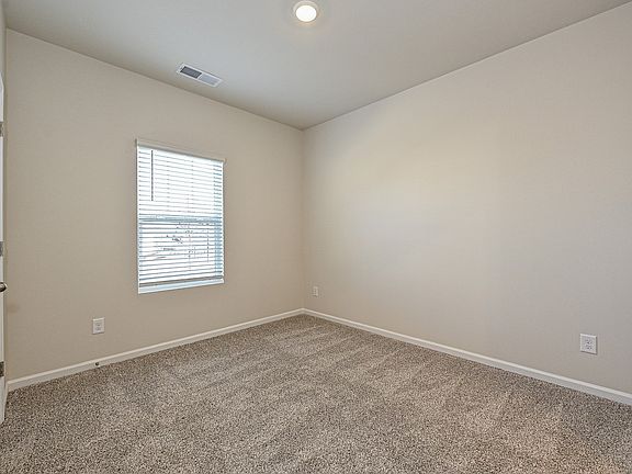 Turn a secondary bedroom into a relaxing guest space.