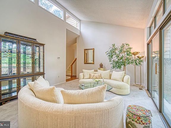 Living room has clerestory windows,new carpeting