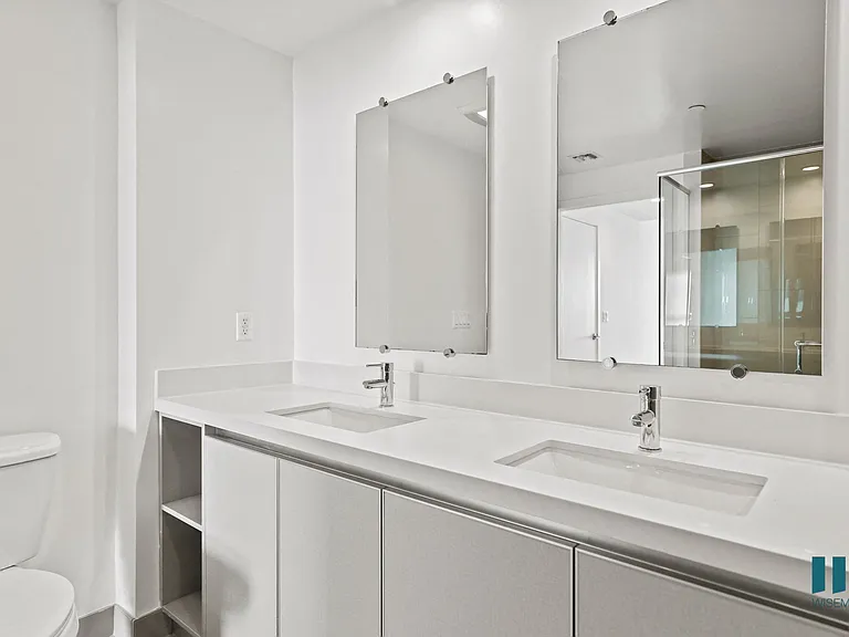 Bathroom with Double-Sink Vanity with Cabinet Storage