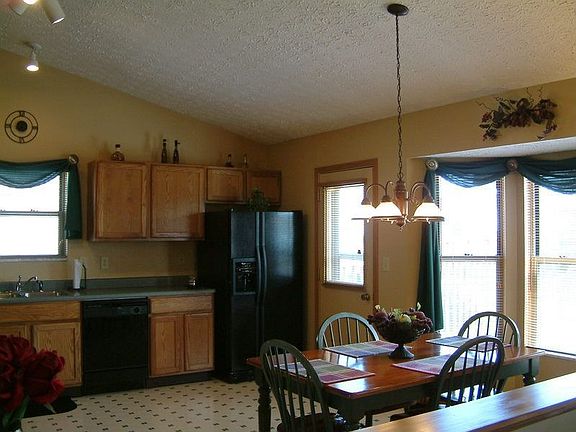 Eat-in kitchen with deck access is open to the family room!