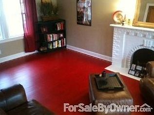 View from waterfall of pool and large back deck.