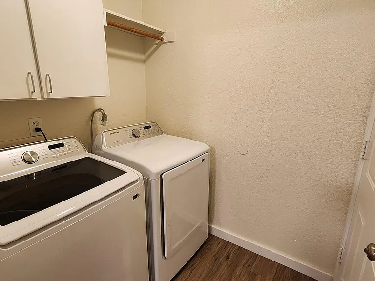 No need to go the the laundromat. High-end washer and dryer included with cabinets for your supplies.