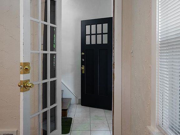 Apartment entry is from an indoor landing area inside the from door. Two locked doors to enter means added security.