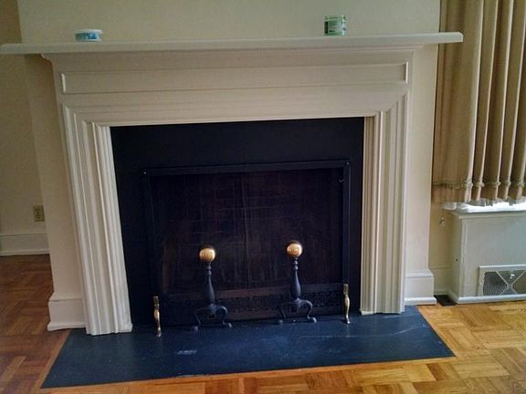 Woodburning fireplace in living room