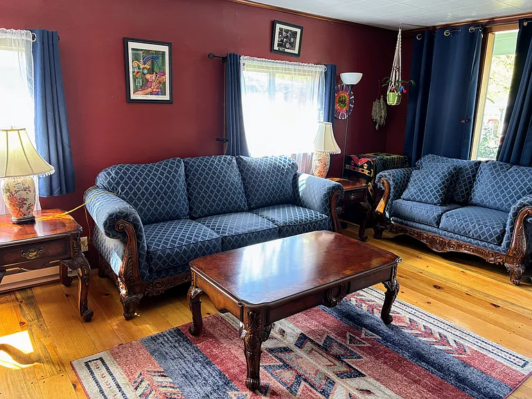 If you rent furnished - Through the front door you'll be welcomed by the living room, complete with comfortable and beautifully maintained sofa and love seat set with matching coffee and end tables - beautiful wood floors in living and dining room :-)