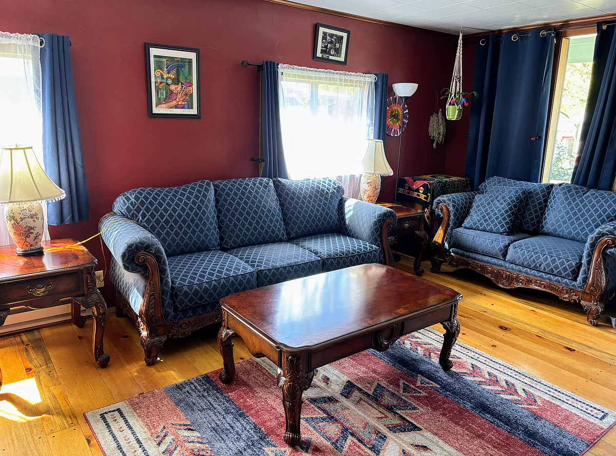 If you rent furnished - Through the front door you'll be welcomed by the living room, complete with comfortable and beautifully maintained sofa and love seat set with matching coffee and end tables - beautiful wood floors in living and dining room :-) - 1535 SE Mill St