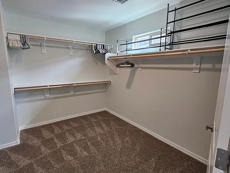 Primary walk-in closet