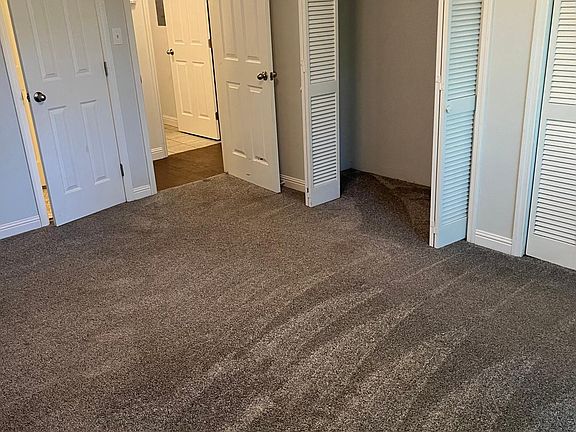 carpeting in both bedrooms less than 1 year old