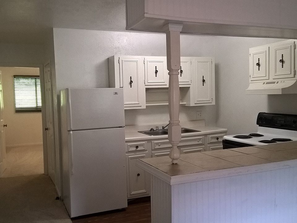 Kitchen includes Refrigerator and Stove
