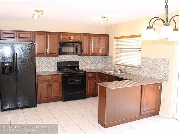 5th image of 1413 NW 122nd Ter #1413